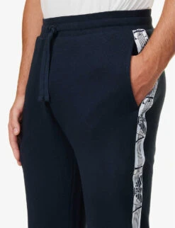 Emporio Armani Brand-tape Regular-fit Cotton-blend Jogging Bottoms 11 Emporio Armani Brand-tape Regular-fit Cotton-blend Jogging Bottoms -Baker Klein Shop R04142170 MARINE ALT04